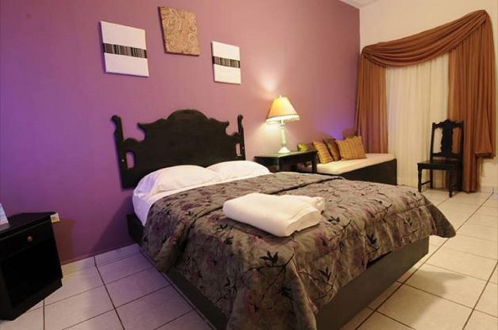 Uw Oasis Hotel La Ceiba Exterior photo